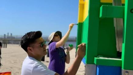Constituents painting the lifeguard tower