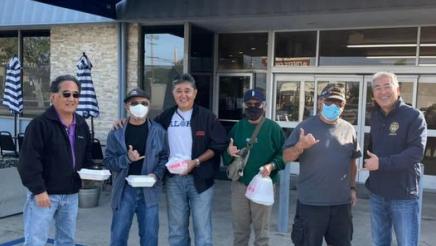 Assemblymember Muratsuchi stands with five other men in front of a business called Gardena Bowl. 