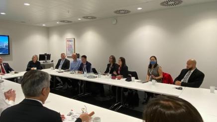 Meeting participants at large table