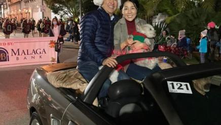 Asm. Muratsuchi and wife with dog in back of convertible