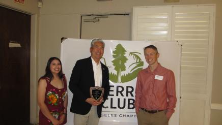 Asm. Muratsuchi holding award, with Sierra Club members