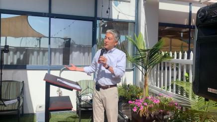 Assemblymember Muratsuchi speaks in front of the crowd. 
