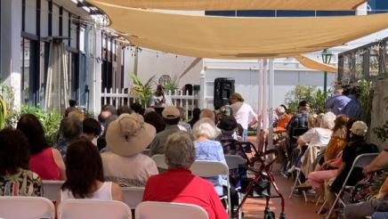 Panelist speaks to group of senior citizen constituents. 