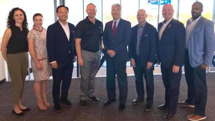 Assemblymember Muratsuchi poses for a group photo with representatives from Boeing, Lockheed Martin, and Northrop Grumman