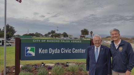 Asm. Muratsuchi and Councilmember Dyda alongside Ken Dyda Civic Center sign