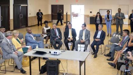 Asm. Muratsuchi in discussion with other legislators and officials