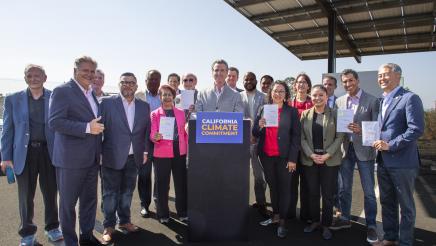 Assemblymember Al Muratsuchi poses for a photo with Governor Gavin Newsom and other members of the State Assembly. 