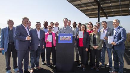 Assemblymember Al Muratsuchi poses for a photo with Governor Gavin Newsom and other members of the State Assembly. 