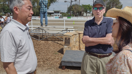 Assemblymember Al Muratsuchi listening to a group of constituents speak. 