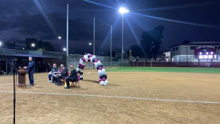 Asm. Muratsuchi at podium in front of home base, with wide view of field