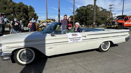 Asm. Muratsuchi in his 1960 Bonneville parade car, with standing couple