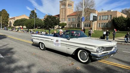 Asm. Muratsuchi being driven in his 1960 Bonneville parade car