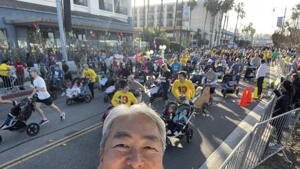 Multiple parent runners, pushing children in strollers