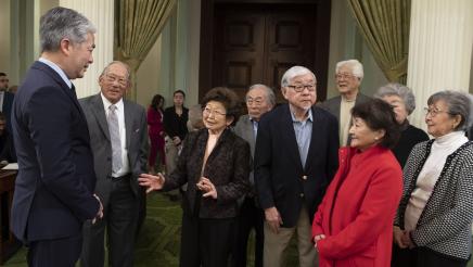 Asm. Muratsuchi speaking with Japanese-American honorees on the Assembly Floor