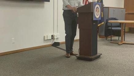 Asm. Muratsuchi at podium, speaking