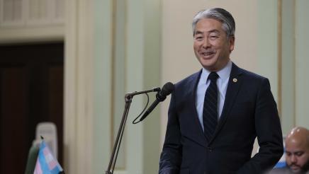 Asm. Muratsuchi standing at microphone, speaking on the Assembly Floor
