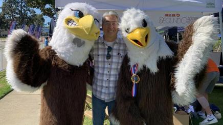 Asm. Muratsuchi with two eagle mascots