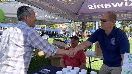 Asm. Muratsuchi greeting El Segundo Kiwanis booth staffers