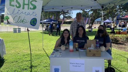 Asm. Muratsuchi at booth with ESHS Climate Club members