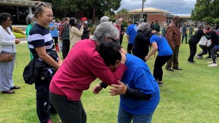 Seniors engaged in combat practice with instructors