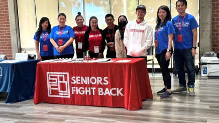 Seniors Fight Back staff at table