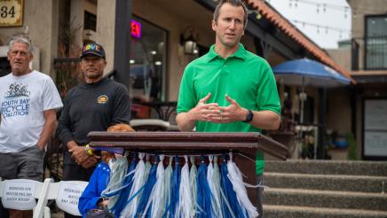 Guest speaker at podium, addressing attandees