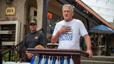 Guest speaker at podium, addressing attandees