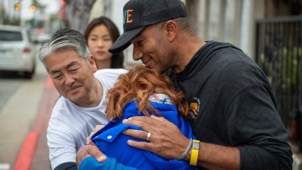 Asm. Muratsuchi and guest embrace an emotional Rabbi Gila Katz