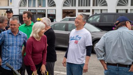 Asm. Muratsuchi shares a light moment with attendee