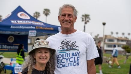 Two South Bay Bicycle Coalition members posing for photo