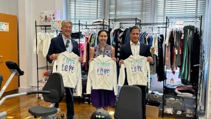 Asm. Muratsuchi, Sup. Carvalho and Tanya Ortiz Franklin holding up sweatshirts