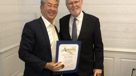 Asm. Muratsuchi presenting resolution to Dan Ashcraft
