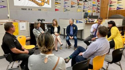 Circled chairs featuring Asm. Muratsuchi in a meeting with school district staff, city representatives and school staff