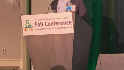Asm. Muratsuchi at podium, speaking