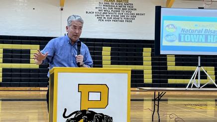 Asm. Muratsuchi at podium, speaking