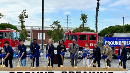 Asm. Muratsuchi and others holding shovels in dirt during ceremony