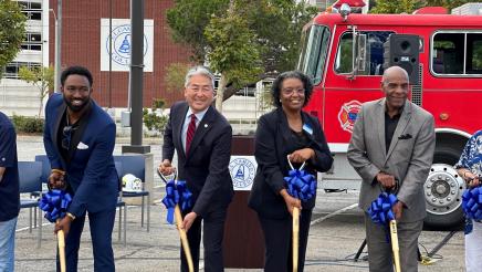 Asm. Muratsuchi and others holding shovels in dirt during ceremony
