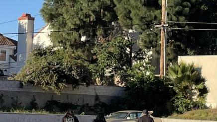 Homeless outreach coordinators walking through parking lot