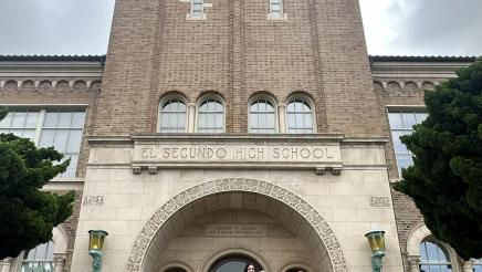 Asm. Muratsuchi with school and district staff in front of tower portion of school building