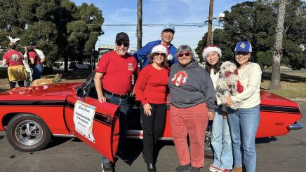 Asm. Muratsuchi and family with constituents in front of parade car