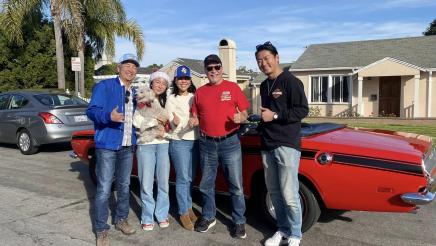 Asm. Muratsuchi and family with constituents in front of parade car