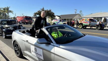 Asm. Muratsuchi sitting high in back of parade car