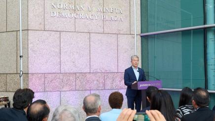 Asm. Muratsuchi at podium, speaking to audience