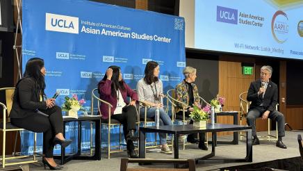 Asm. Muratsuchi onstage with other panelists, speaking
