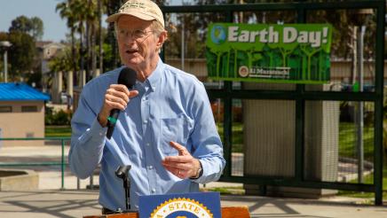 Actor Ed Begley Jr. at podium, speaking