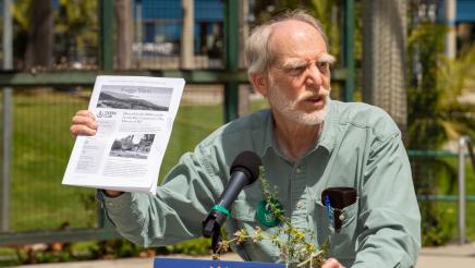 Representative from the Sierra Club at podium, speaking
