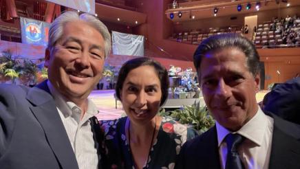 Asm. Muratsuchi with board member Ortiz Franklin and Sup. Carvalho with stage and seating in background