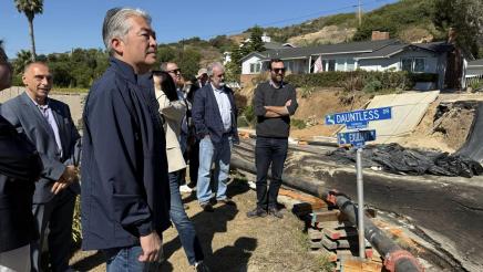 Asm. Muratsuchi and other officials standing next to temporary pipeline and viewing area