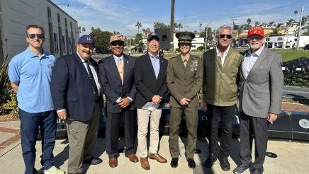Asm. Muratsuchi standing with veterans and attendees