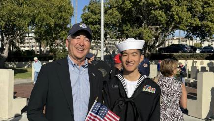 Asm. Muratsuchi with a young sailor in uniform